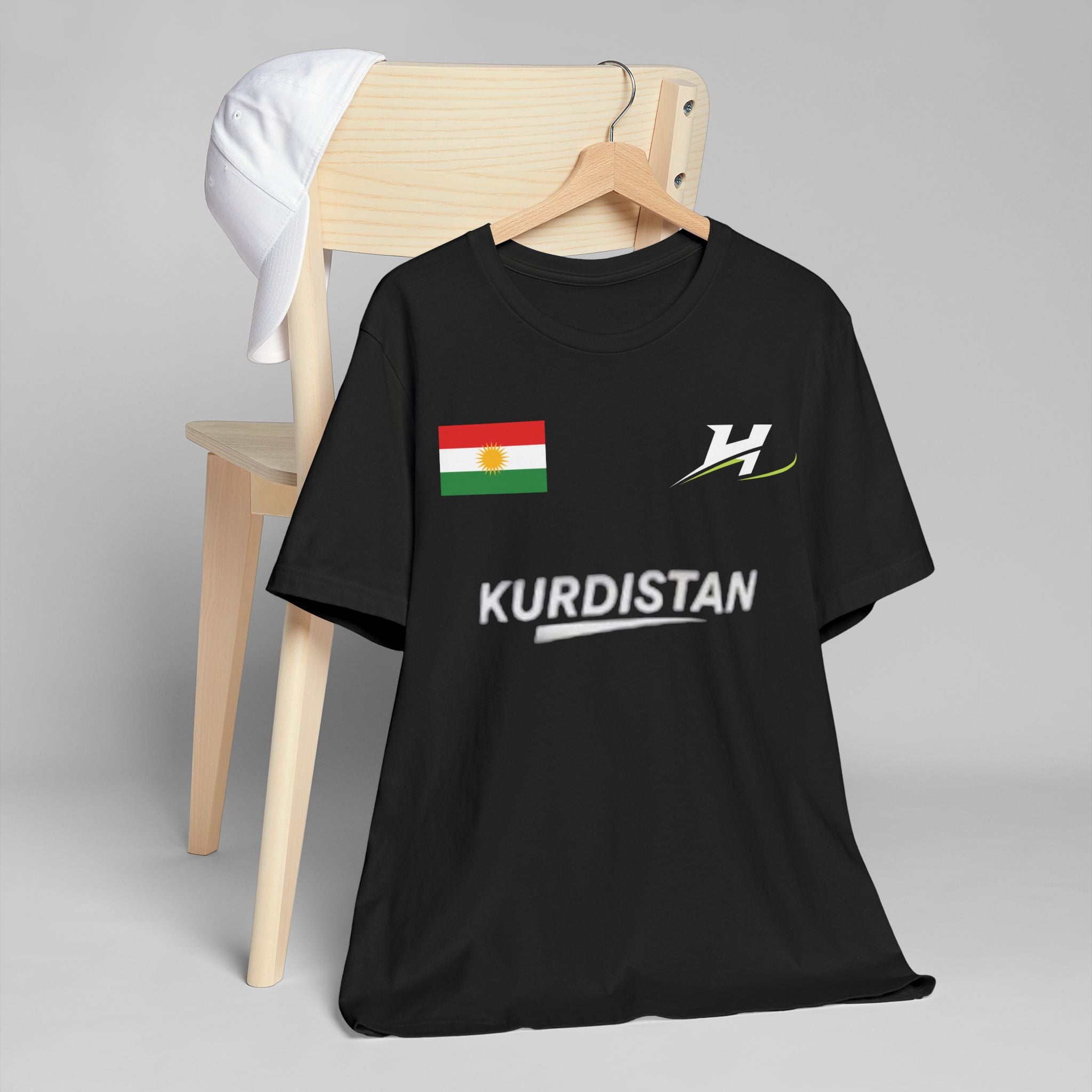 Black Kurdish flag soccer jersey with red and green geometric accents